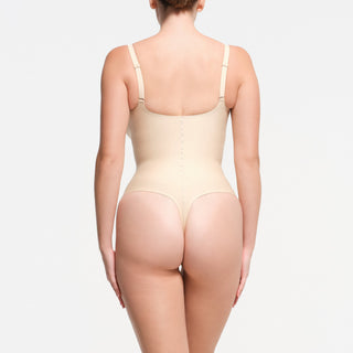 SKIMS BODY CORE SCULPT PLUNGE THONG BODYSUIT | SAND