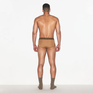 SKIMS COTTON MENS BRIEF | RUSSET