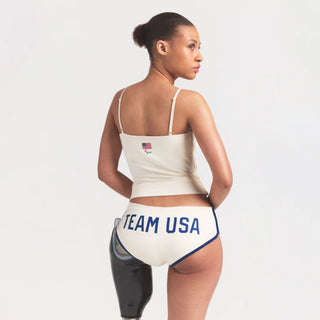 SKIMS FOR TEAM USA COTTON JERSEY PARALYMPIC DOLPHIN BOY SHORT | ECRU