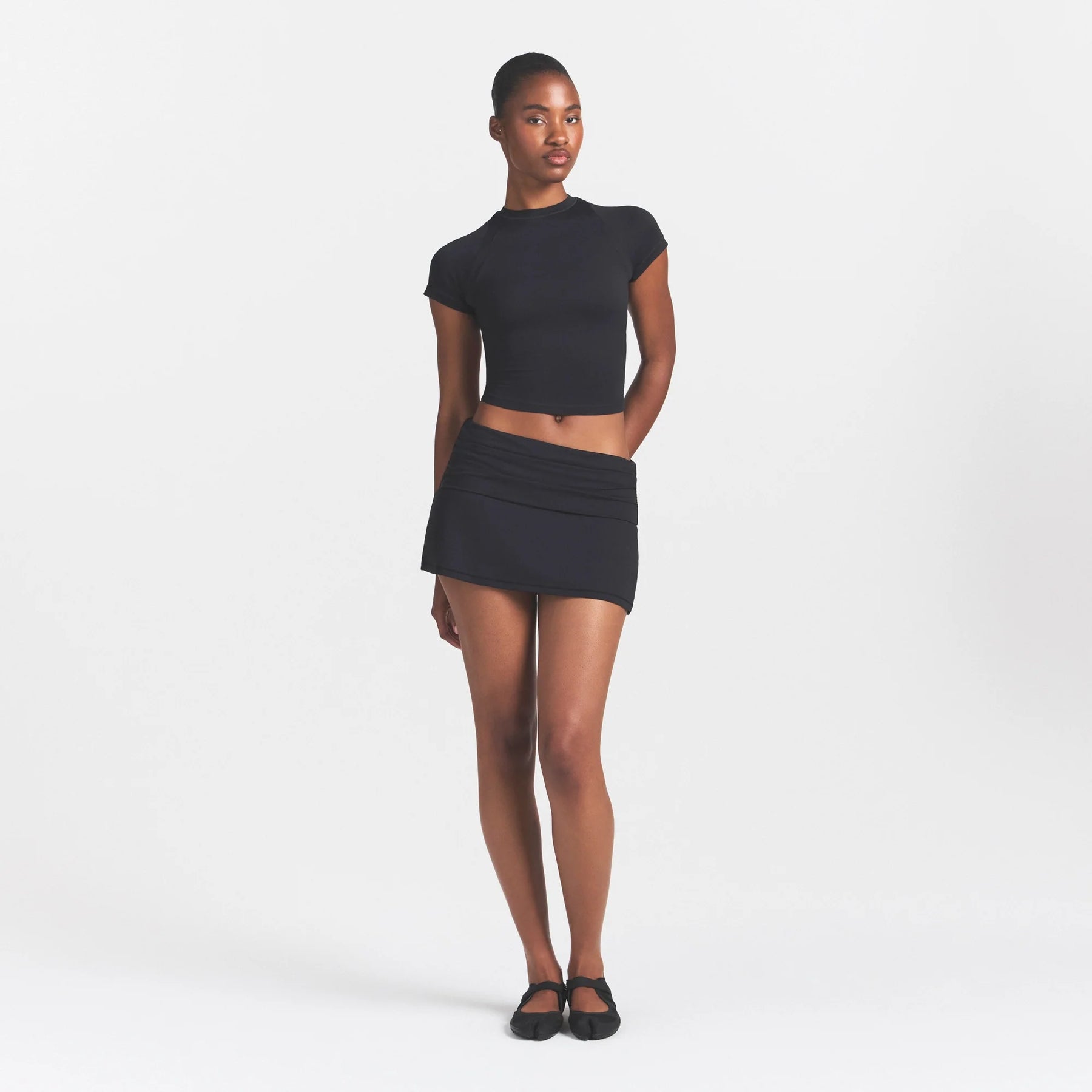 NikeSKIMS AIRY DRI-FIT™ BABY TEE | OBSIDIAN