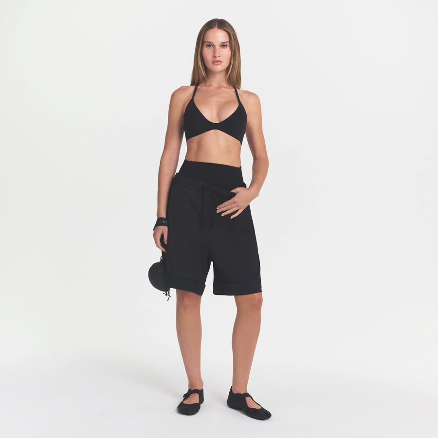 NikeSKIMS STUDIO STRETCH T-BACK TRIANGLE BRA | OBSIDIAN