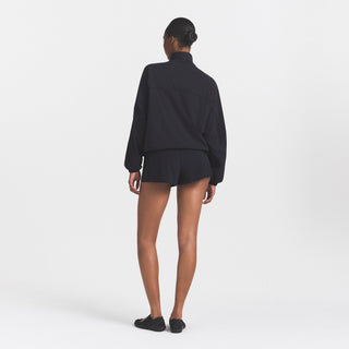 NikeSKIMS STRETCH NYLON OVERSIZED TRACK JACKET | OBSIDIAN