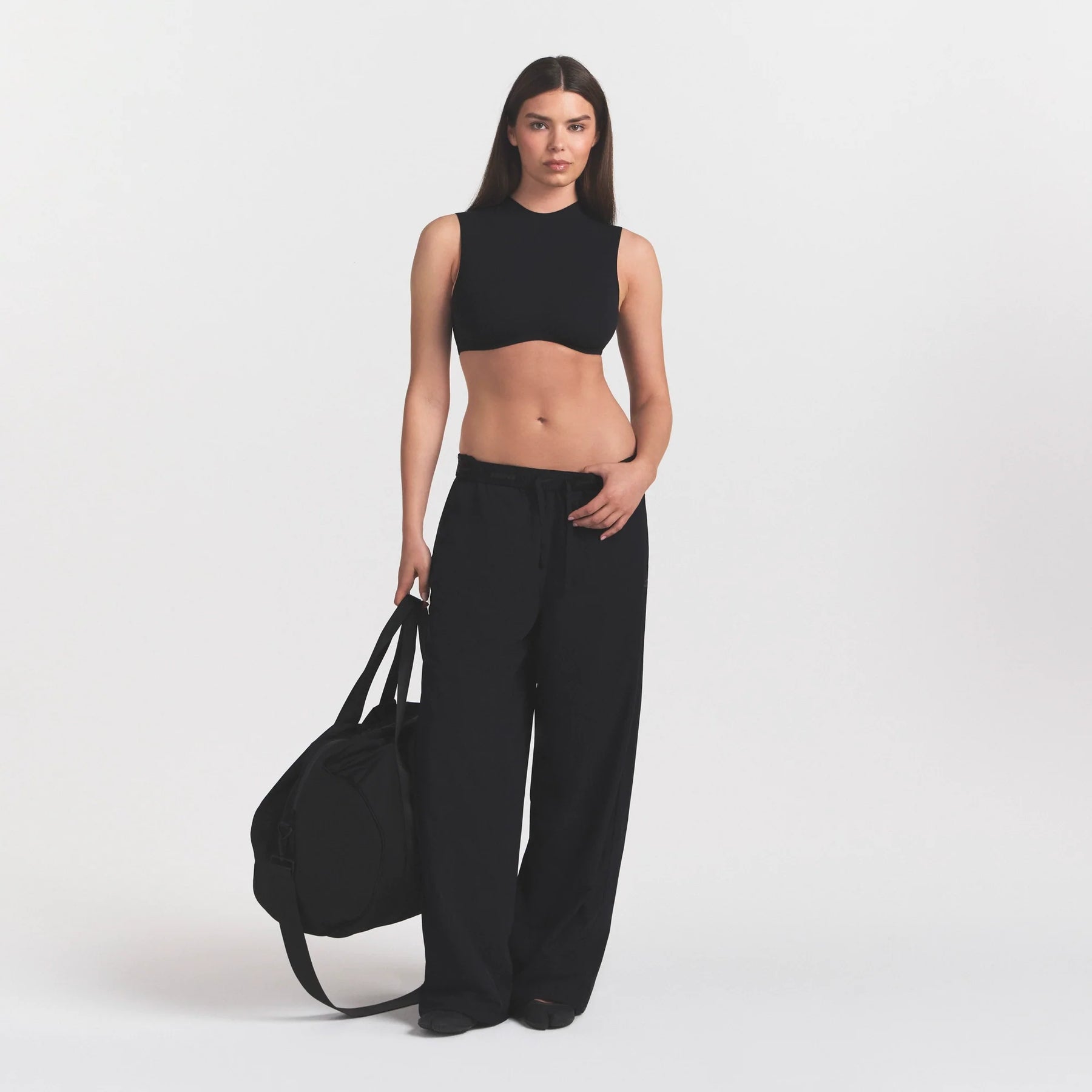 NikeSKIMS STRETCH NYLON OVERSIZED PANT | OBSIDIAN