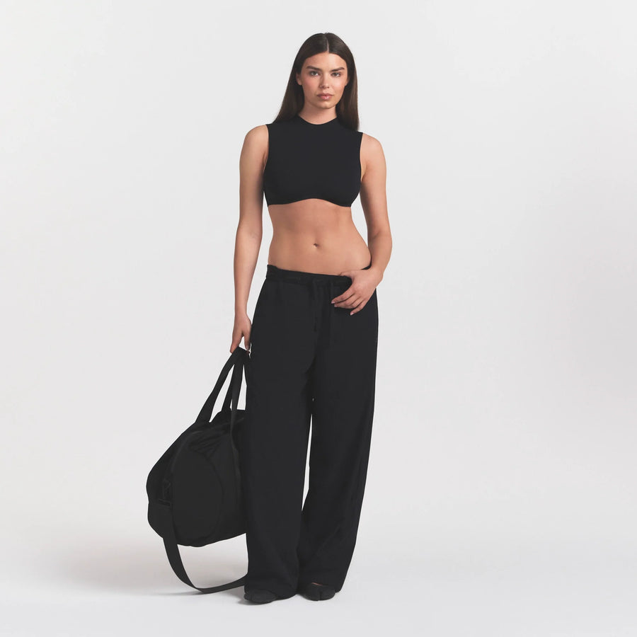 NikeSKIMS STRETCH NYLON OVERSIZED PANT | OBSIDIAN
