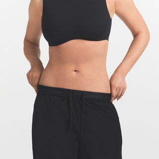 NikeSKIMS STRETCH NYLON OVERSIZED PANT | OBSIDIAN