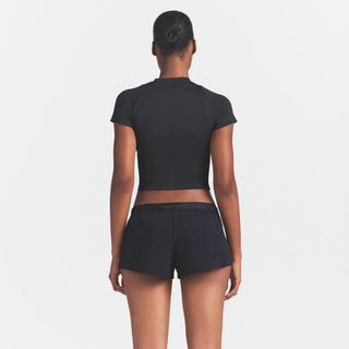 NikeSKIMS STRETCH NYLON RUNNER SHORT | OBSIDIAN