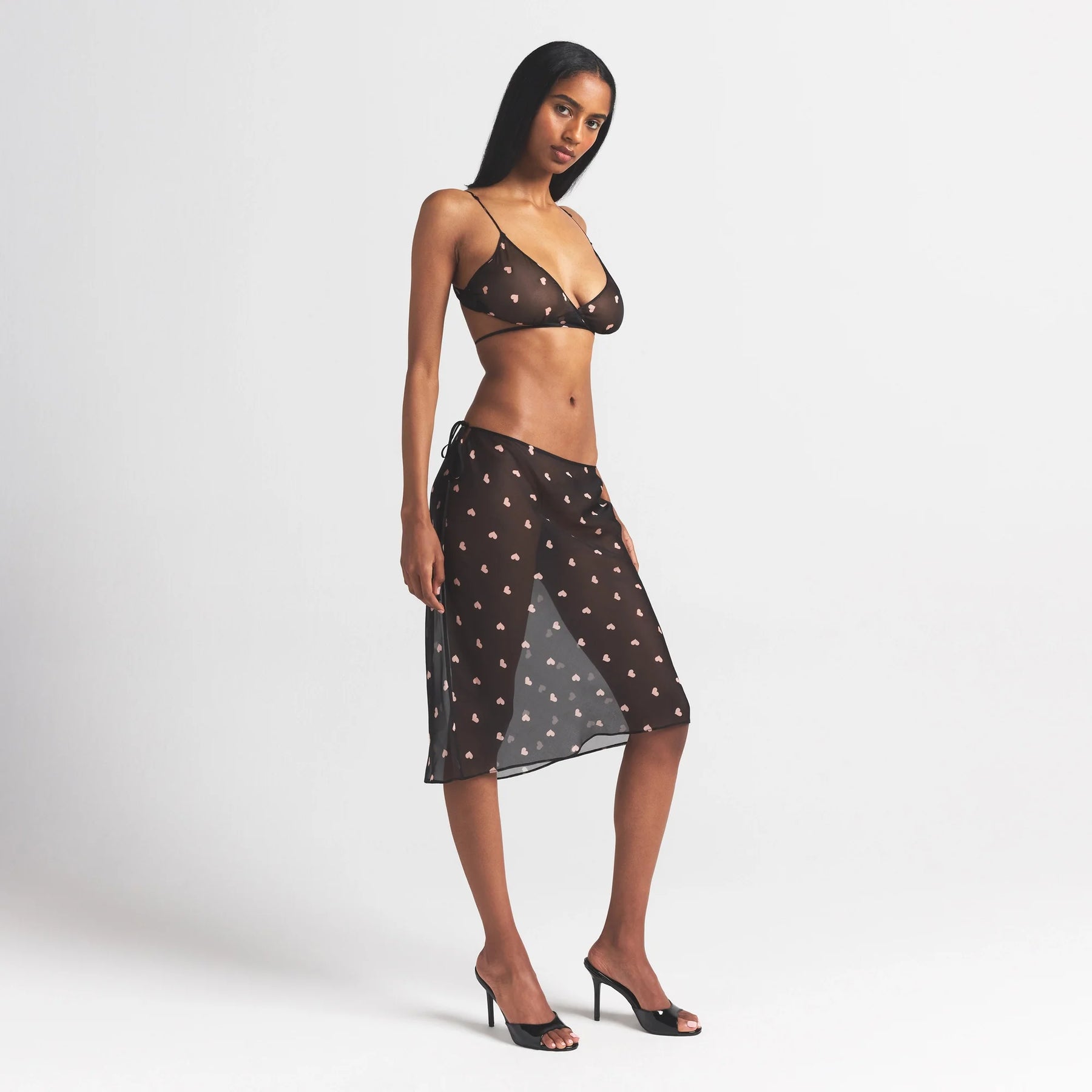 SKIMS ROMANCE TIE SIDE MIDI SKIRT | OBSIDIAN SPACED HEARTS