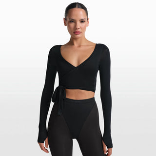 NikeSKIMS STRETCH KNIT WRAP LONG SLEEVE CROPPED TOP | OBSIDIAN