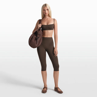 NikeSKIMS MATTE 17" V-LINE CROP LEGGING | DARK SEPIA