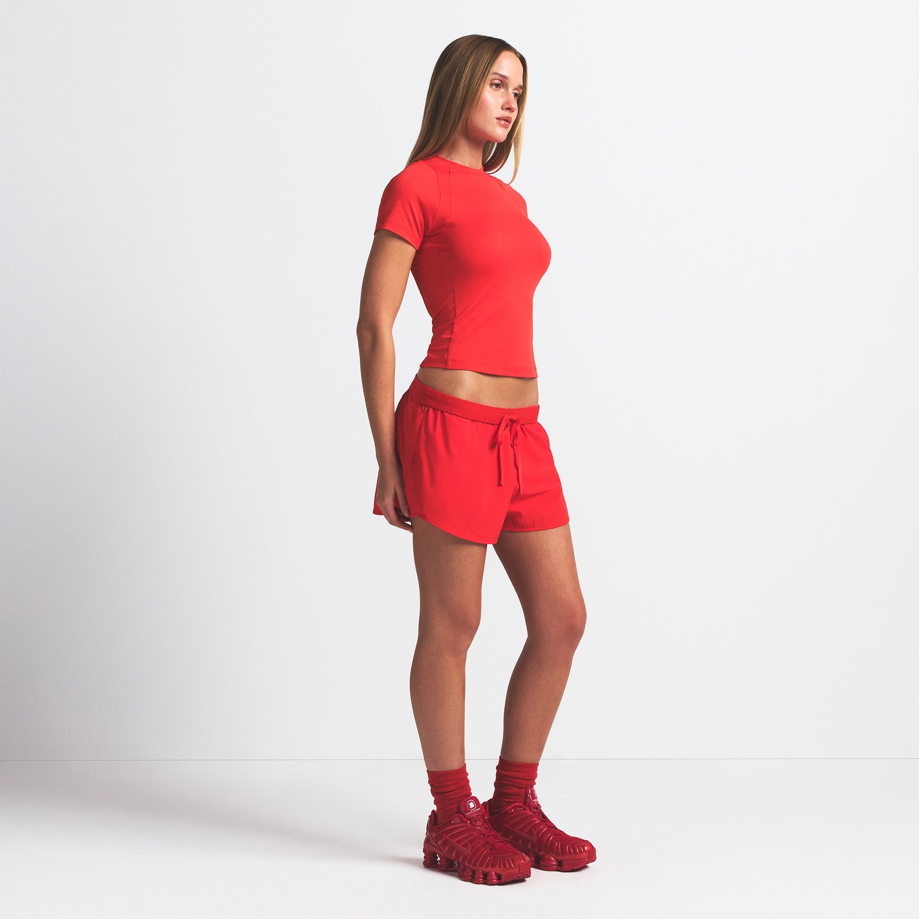 NikeSKIMS WOVEN NYLON 2.5" RUNNER SHORT | RUBY