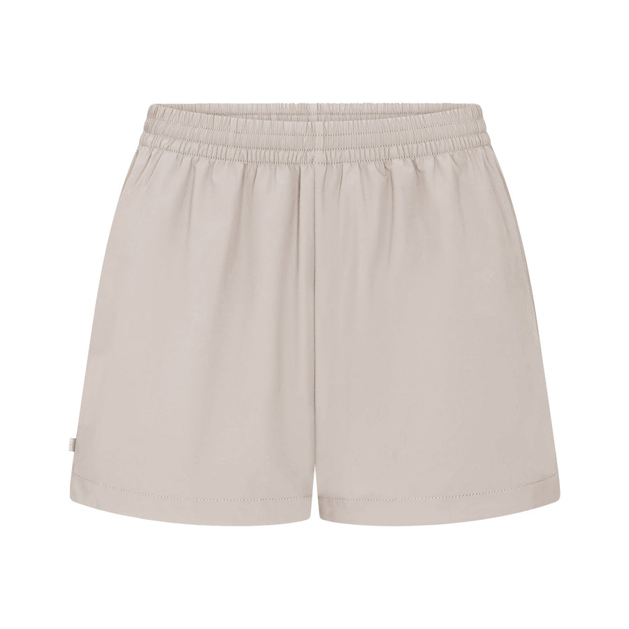 NikeSKIMS WOVEN NYLON 5" TRACK SHORT | STONE