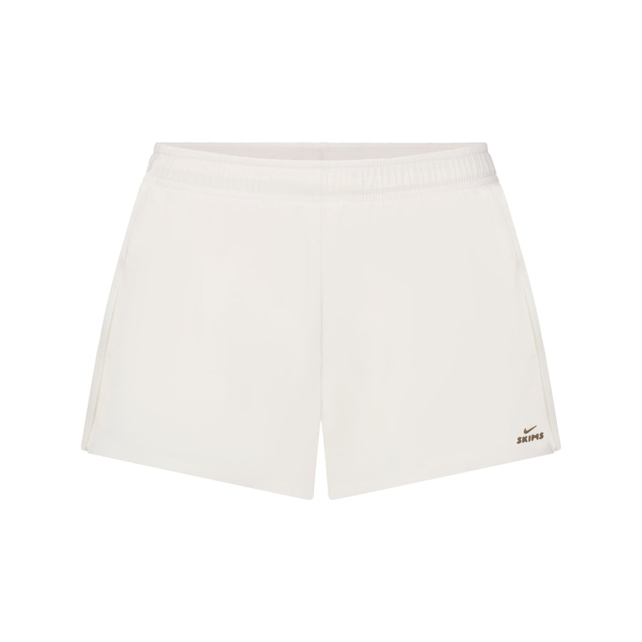 NikeSKIMS STRETCH NYLON RUNNER SHORT | IVORY