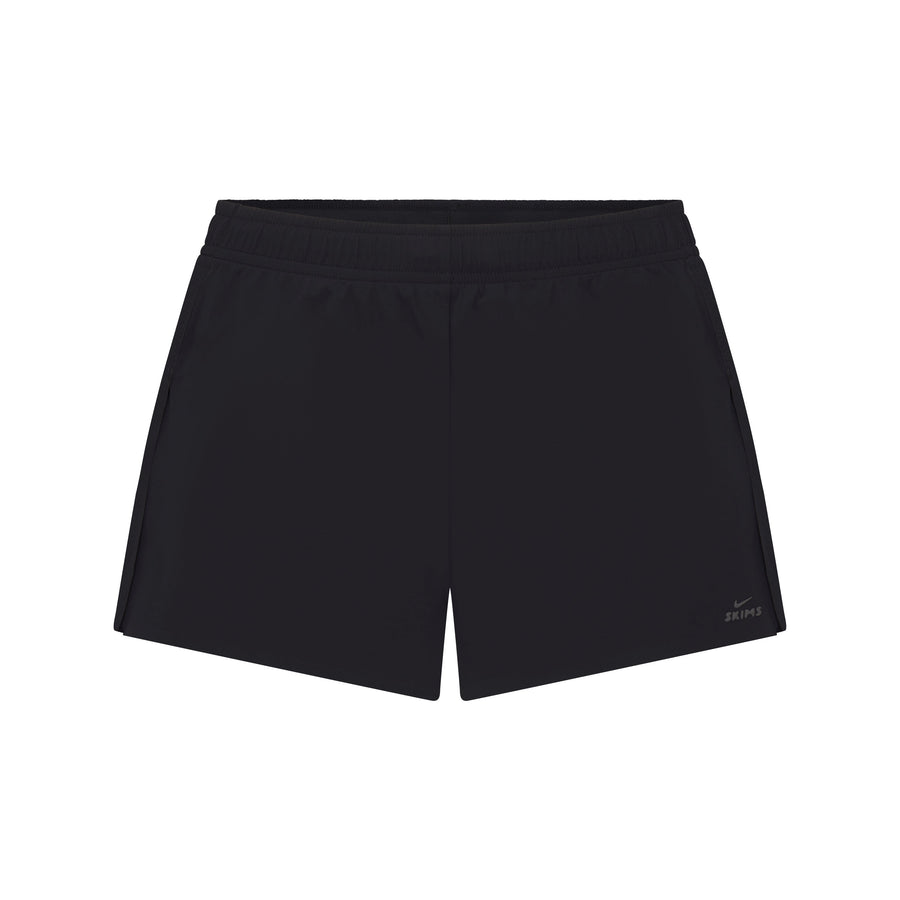 NikeSKIMS STRETCH NYLON RUNNER SHORT | OBSIDIAN