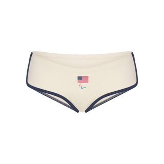 SKIMS FOR TEAM USA COTTON JERSEY PARALYMPIC DOLPHIN BOY SHORT | ECRU