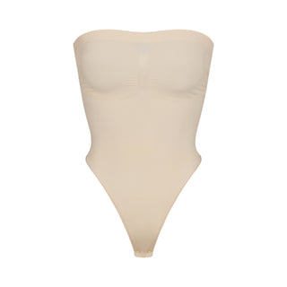 SEAMLESS SCULPT STRAPLESS THONG BODYSUIT | SAND