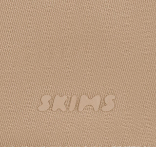 SKIMS ULTIMATE BODY PUSH-UP THONG BODYSUIT | CLAY