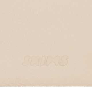 SKIMS ULTIMATE BODY PUSH-UP THONG BODYSUIT | SAND